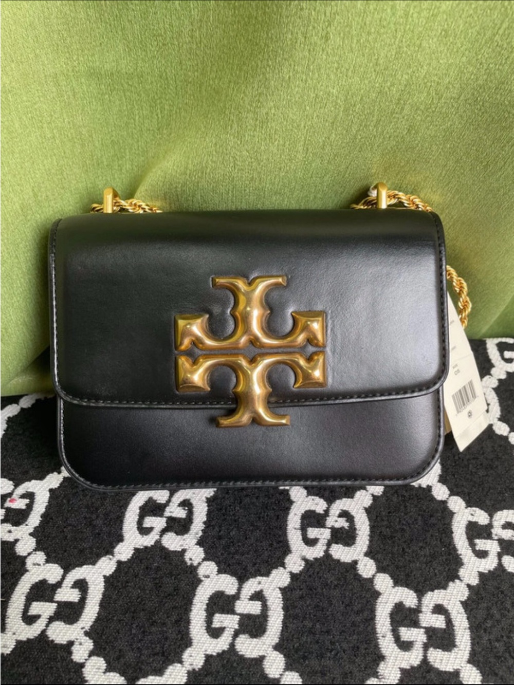 Black Leather Shoulder Bag with Gold Logo Chain